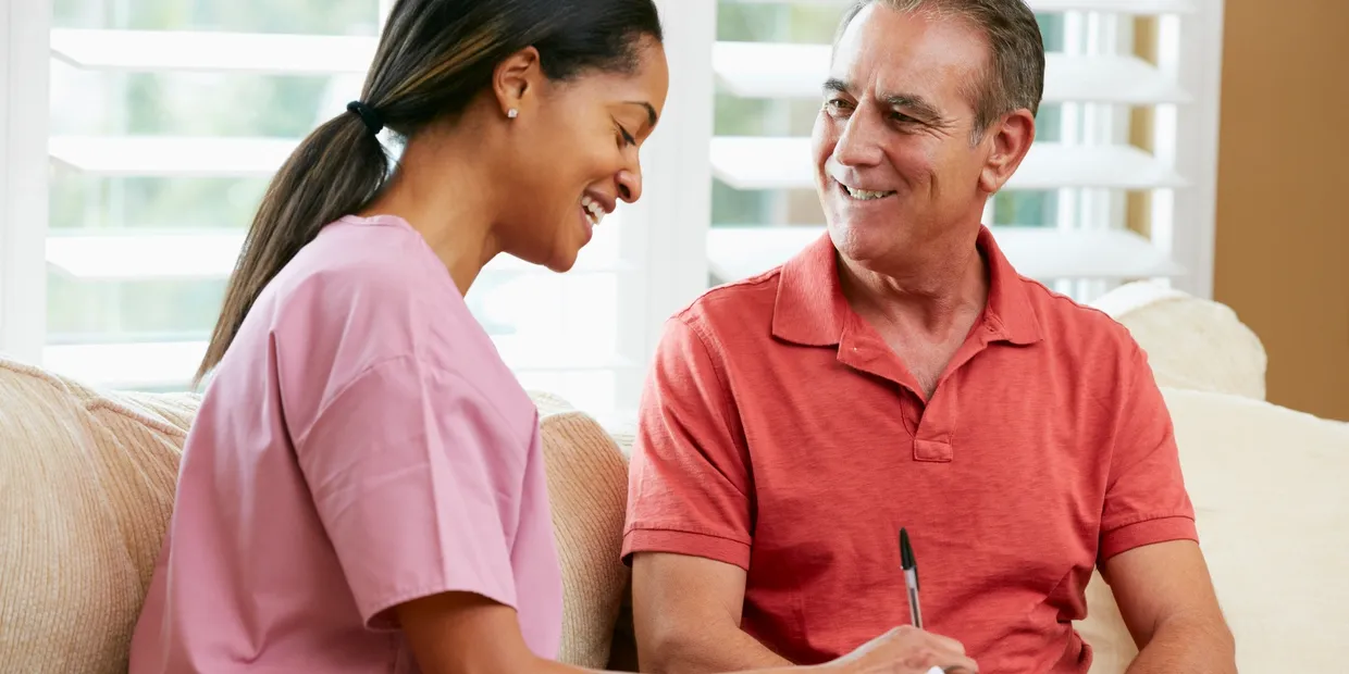 Compassionate caregiver with a client